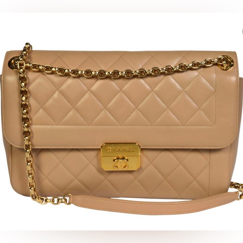 CHANEL beige flap bag with rich gold hardware.  Original dust bag & box.